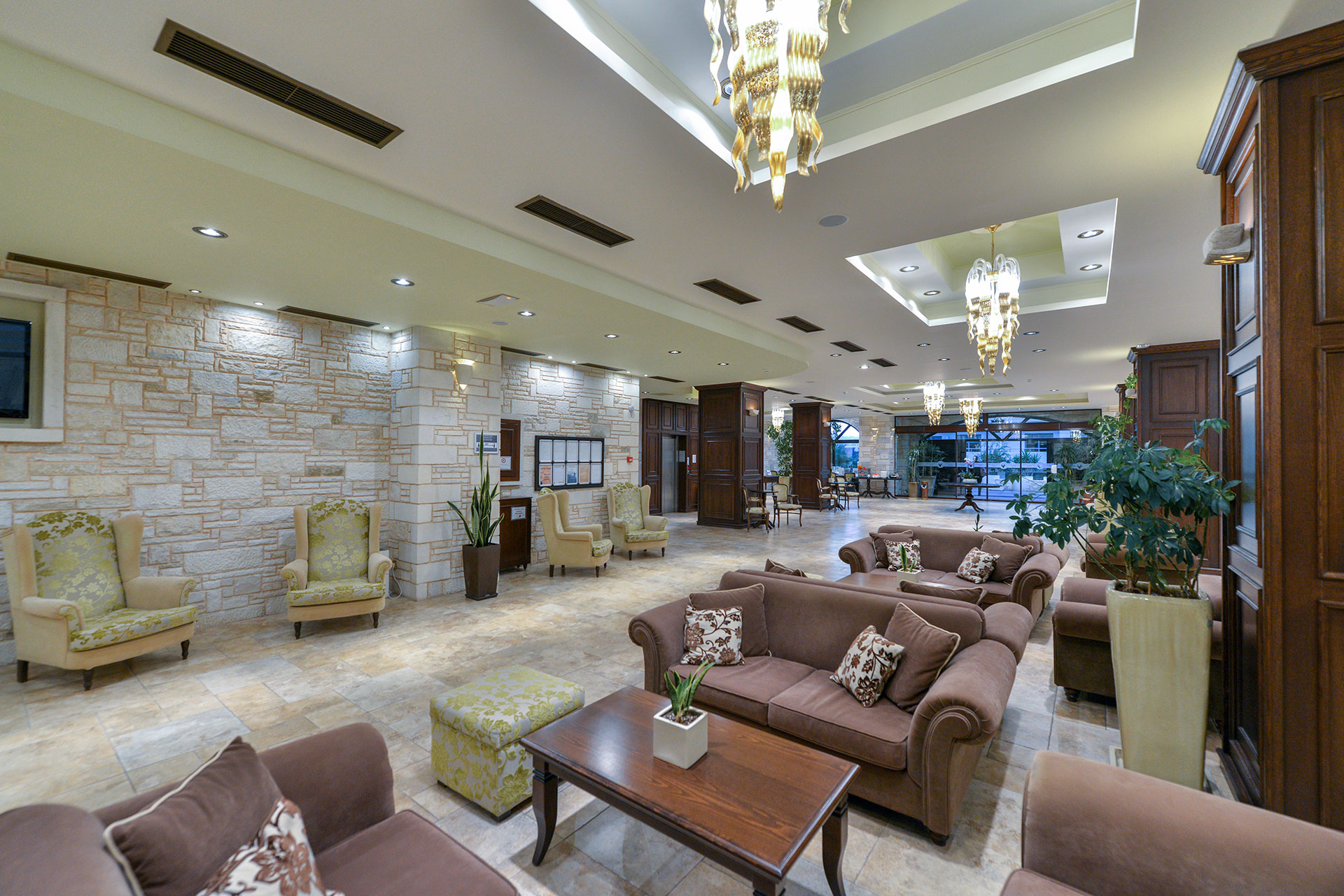 Hotel lobby with double couches and armchairs